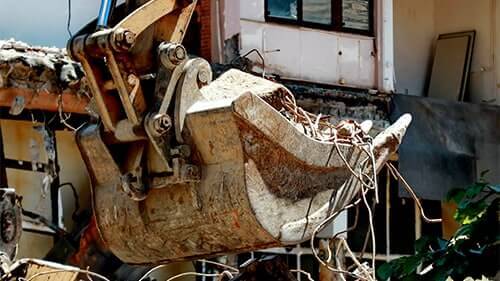 backhoe-used-on-construction-site-after-injury