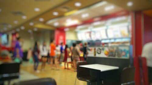 Burger King Worker Inputing Customers Order