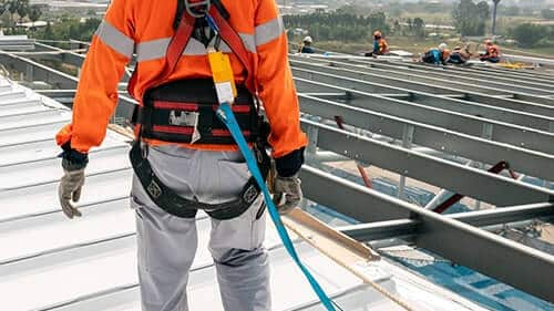construction-worker-with-harness-to-prevent-roof-fall